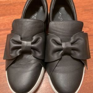 Black bow sneakers